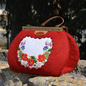 Carpetbag with metal frame.